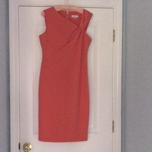 Peach Classic sheath dress.